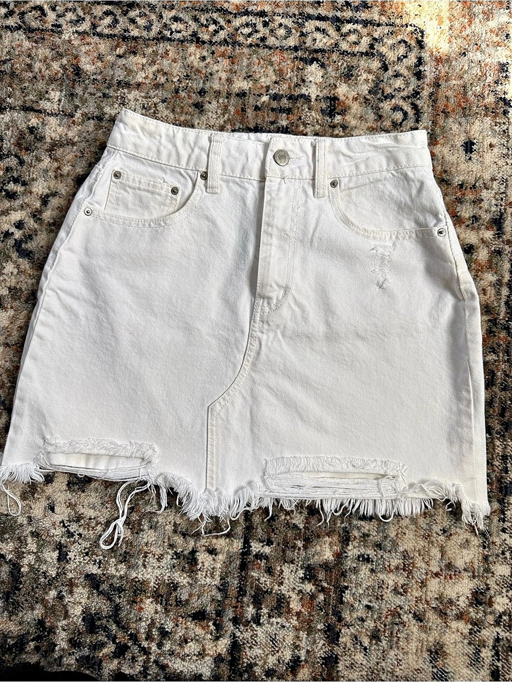 Forever 21 White distressed denim mini skirt.